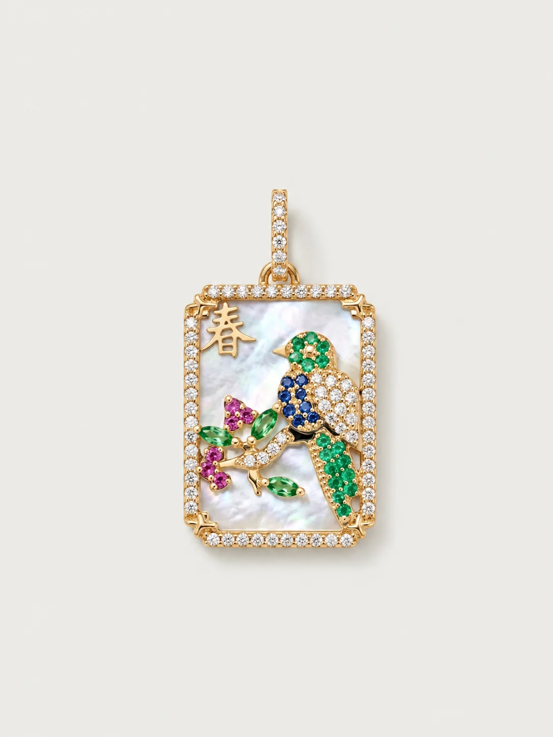 The Bird pendant — emerald, sapphire and diamond bird on a mother-of-pearl mahjong tile framed in diamonds